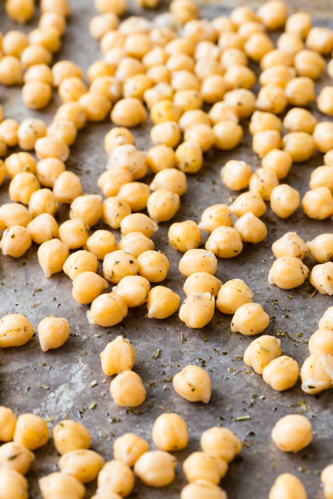 A tray full of chick peas or garbanzo beans before they are roasted