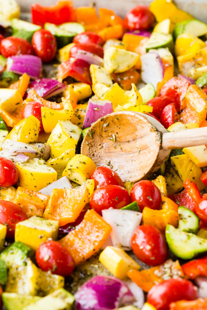 A pan full of vegetables getting ready to be roasted