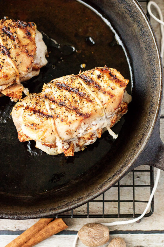 Pork chops stuffed with cinnamon, ginger, and nutmeg flavored apples.