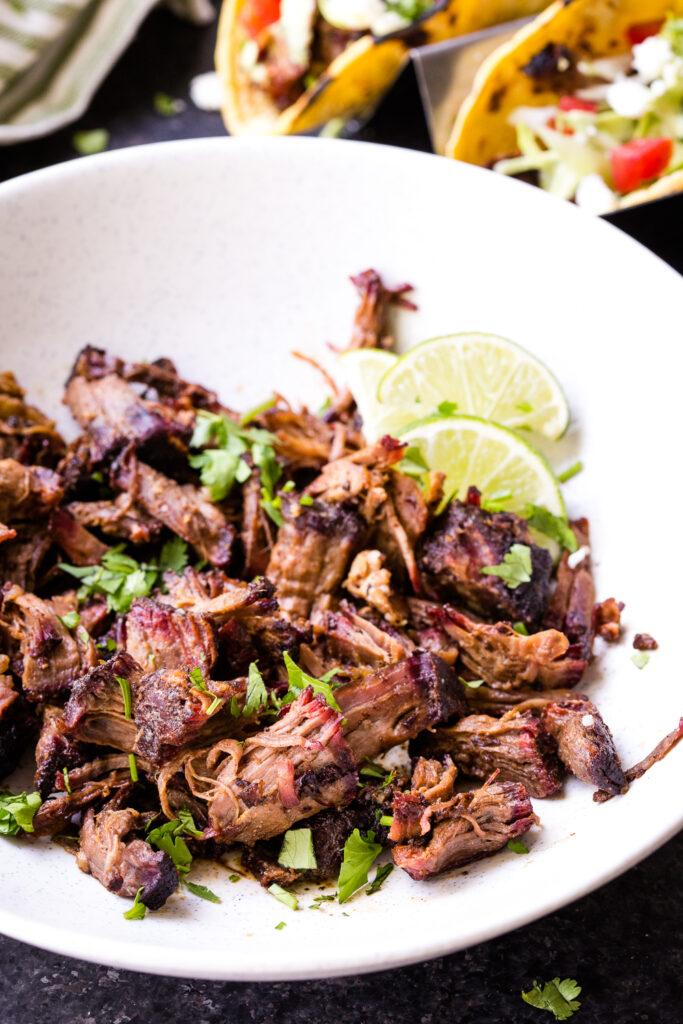 Shredded beef that has been smoked and is to be used for tacos