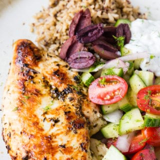 Skillet greek Chicken birds eye close up barely showing plate