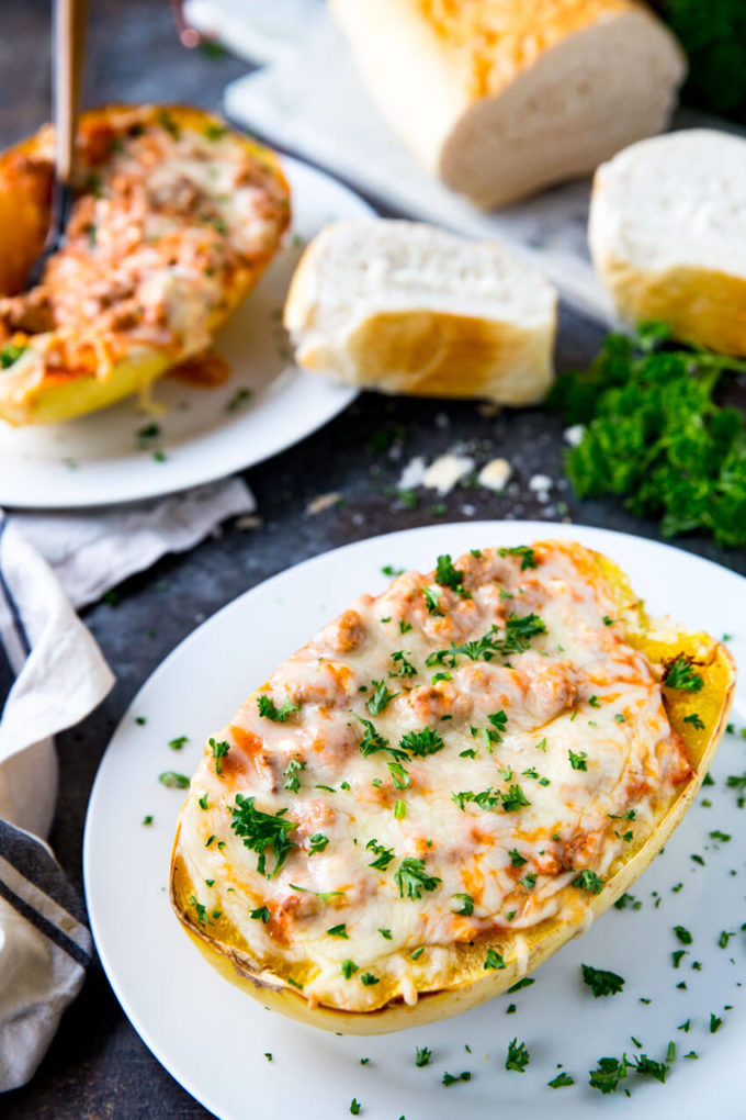 Spaghetti Squash stuffed with Lasagna fillings, this is the best way to eat spaghetti squash ever! Spaghetti squash lasagna