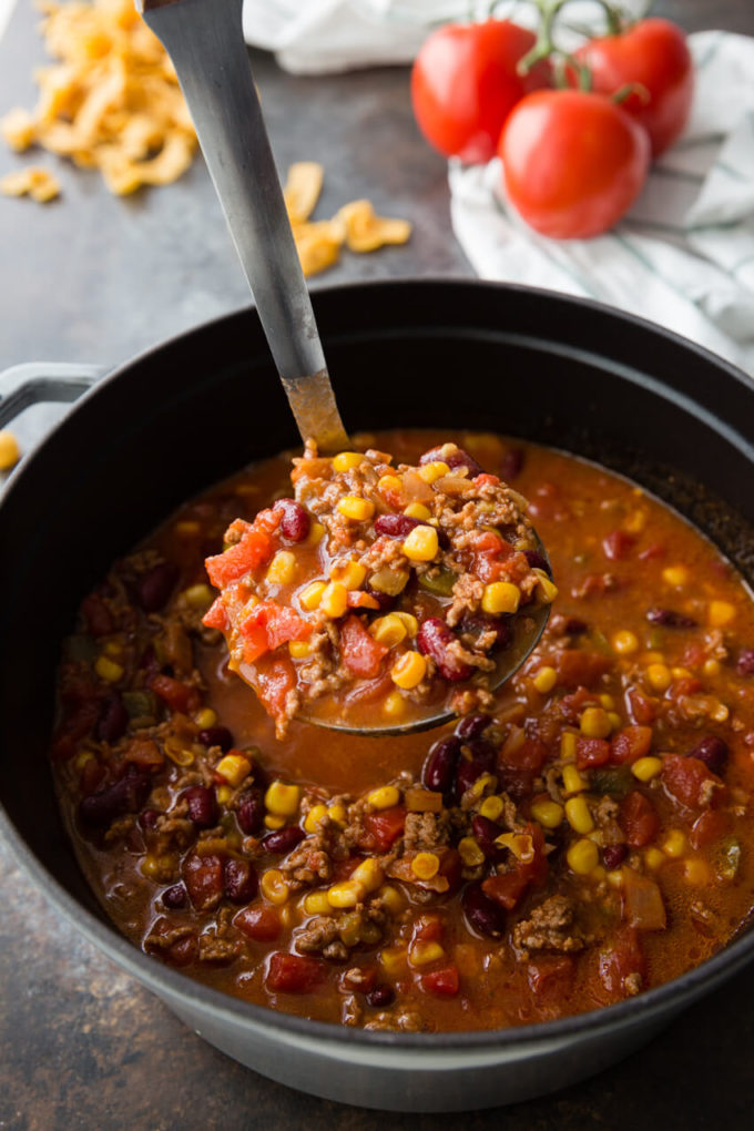 Easy Taco Soup: The most flavorful taco soup you will ever eat takes only 10-15 minutes to throw together. Healthy, easy, full of protein, fiber, and flavor; you can't go wrong with this soup! 