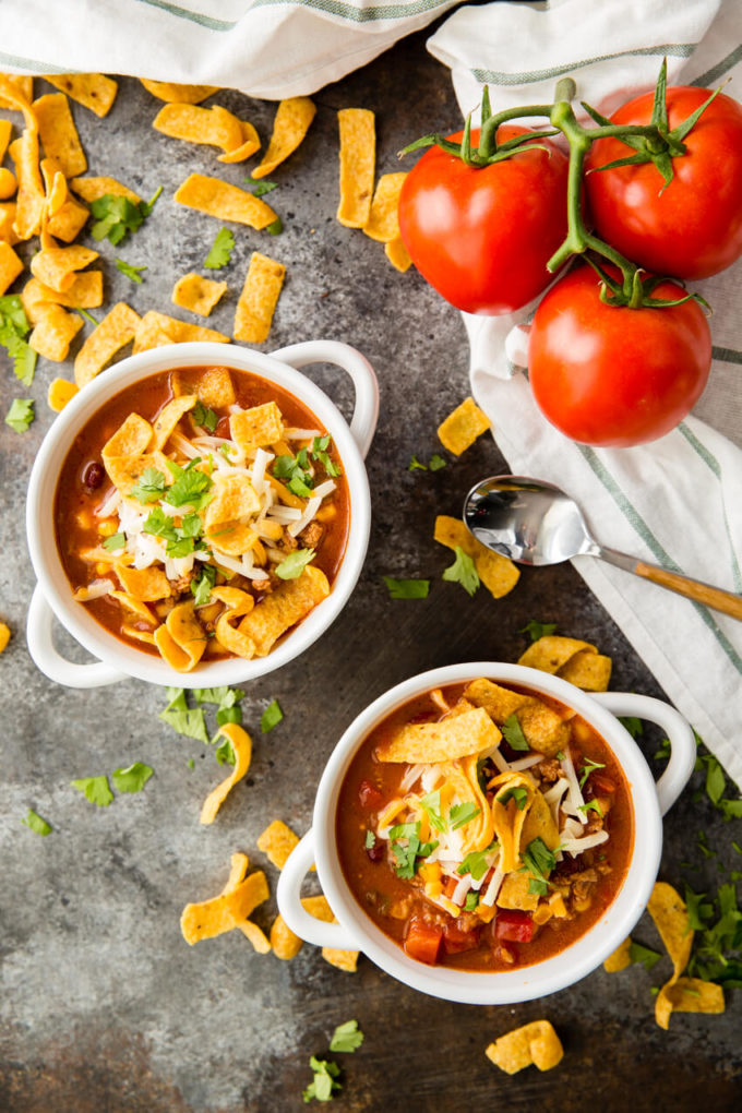 Taco Soup Recipe: The most flavorful taco soup you will ever eat takes only 10-15 minutes to throw together. Healthy, easy, full of protein, fiber, and flavor; you can't go wrong with this soup! 