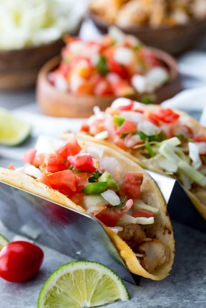 Fish Tacos Tilapia: Tilapia Fish Tacos are mild, flaky, tender, and delicious