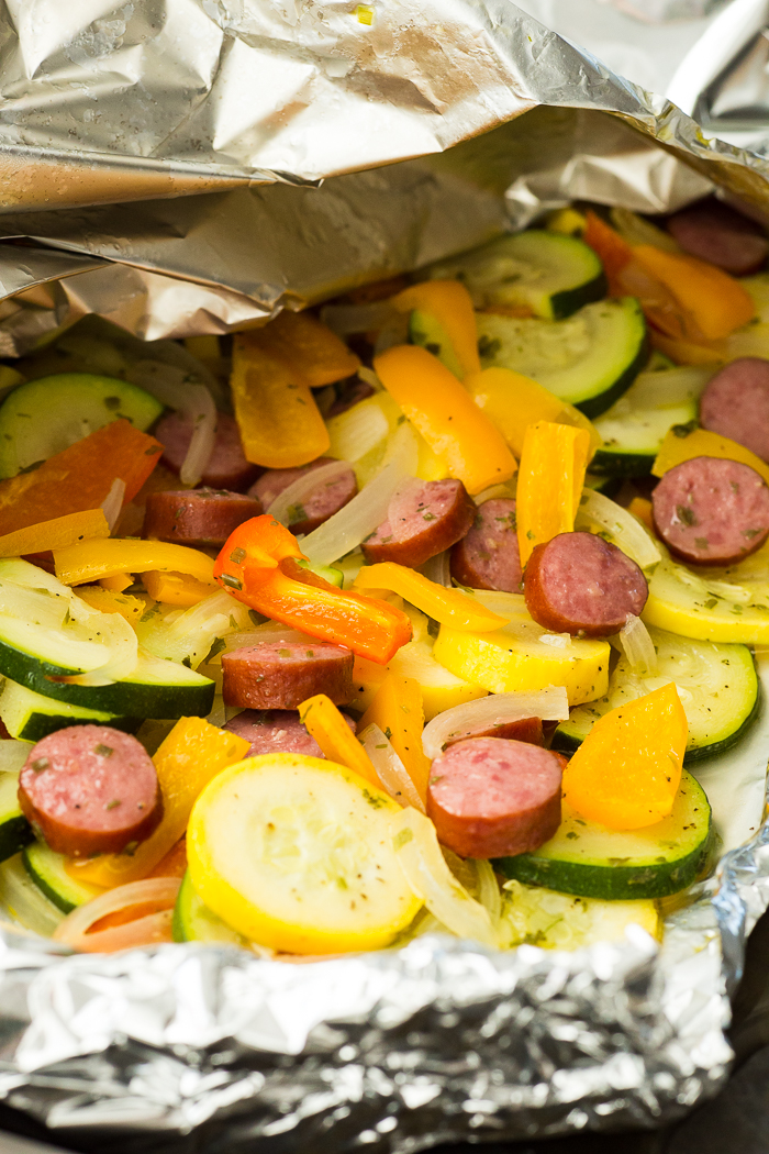 A grill pouch full of turkey bratwurst and zucchini, peppers, etc. 