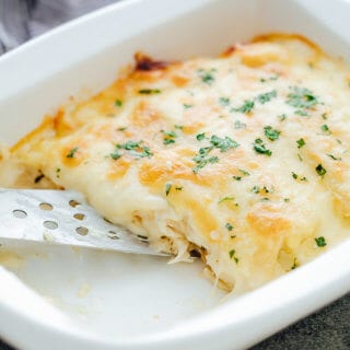 Zesty white chicken enchiladas are creamy and delicious