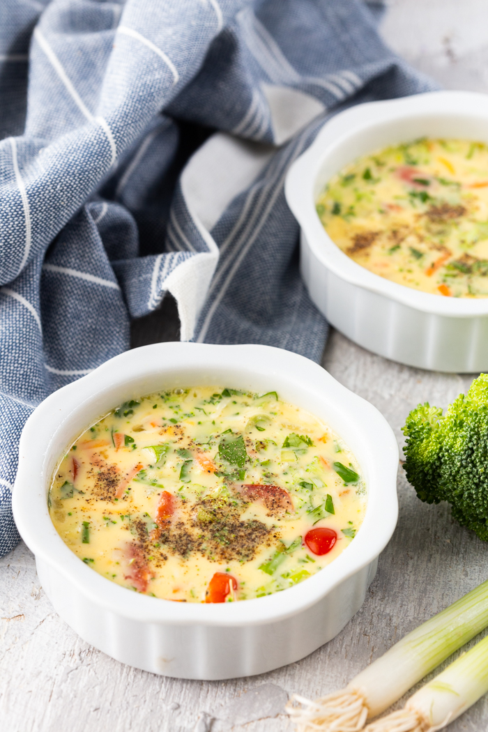 Air fryer egg cups with scrambled egg and vegetables