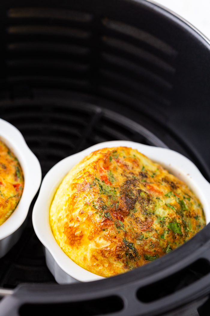 Ceramic ramekins of eggs in the air fryer