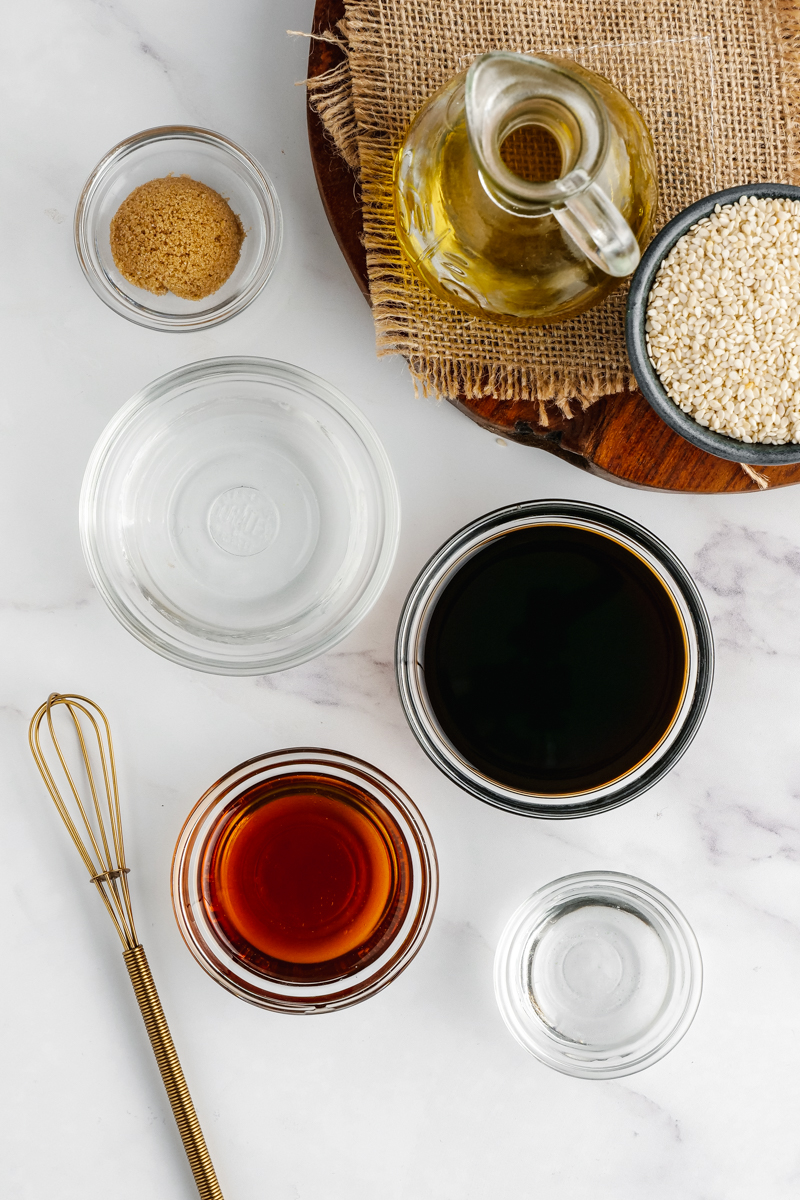 Small portion cups with everything you need for asian pasta salad dressing. 