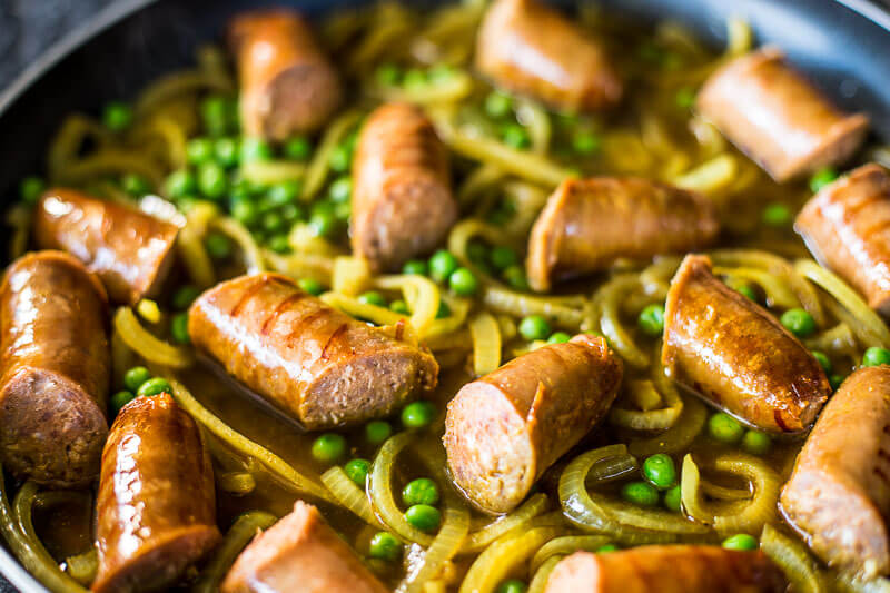 Best Curried Sausages Recipe - Creamy, easy deliciousness in a warming bowl ready to chow down with a side of fresh mash potato. Yes please! | wandercooks.com