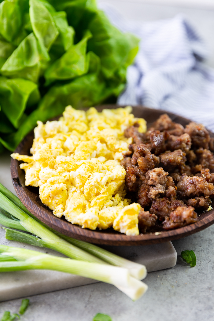 ingredients in a brown bowl for breakfast lettuce wraps