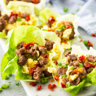 breakfast lettuce wraps on a white board