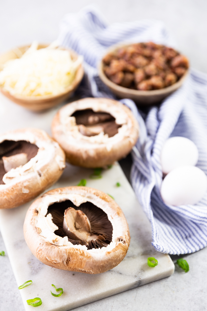 All the ingredients for a breakfast stuffed portobello mushroom