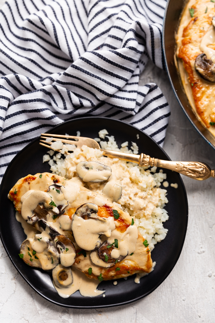 Chicken marsala, a creamy chicken dish served over cauliflower rice