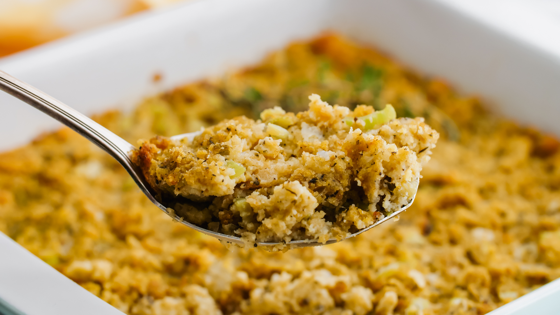 cornbread dressing on a spoon 