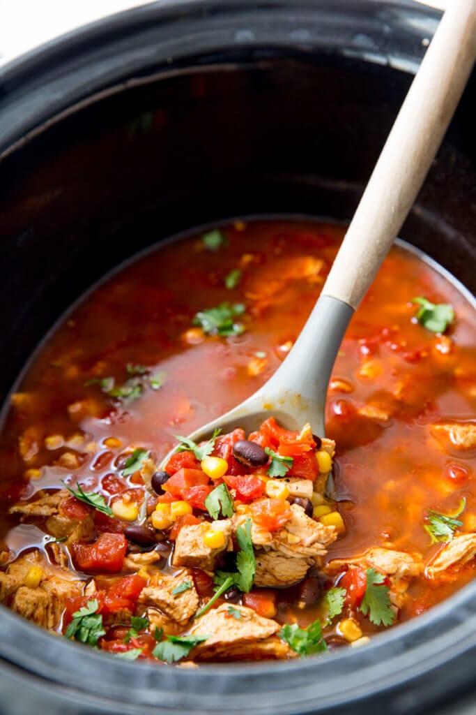 Slow Cooker Chicken Tortilla soup is an easy soup for cold weather or warm