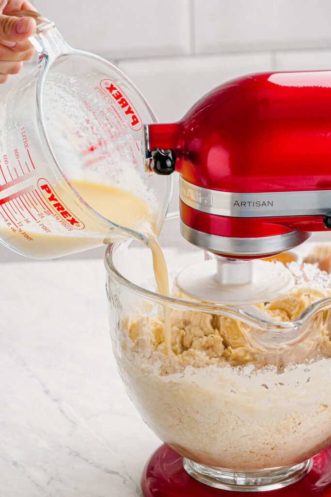 Making dinner rolls, combining dry and wet ingredients