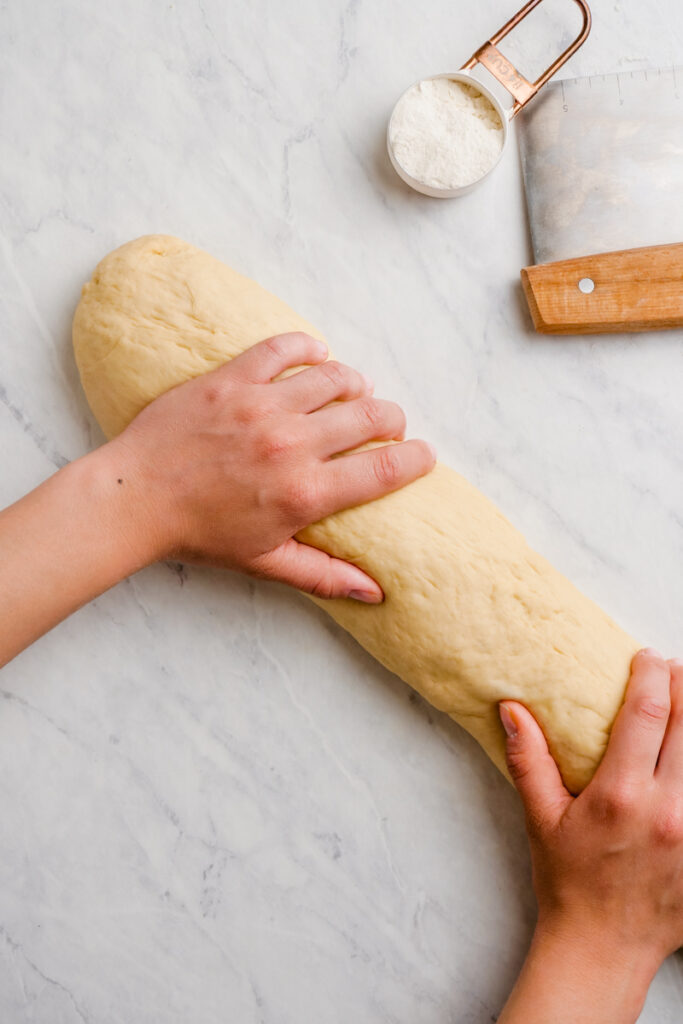 Forming dinner rolls into the right shape