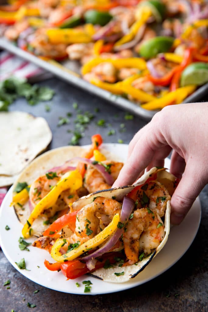 Eating flavorful shrimp fajitas