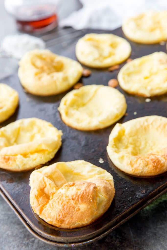 Puffy German Pancakes are an easy to make puff pancake in muffin tin size