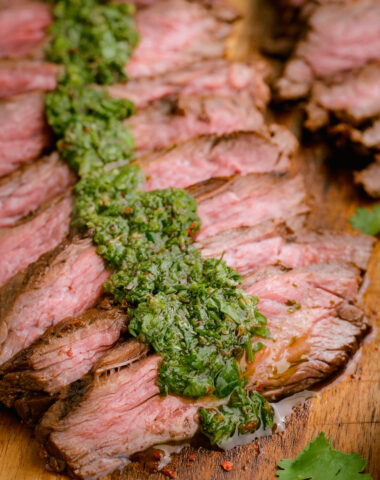 Grilled skirt steak topped with chimichurri