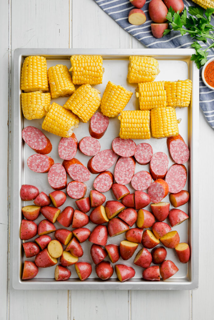 A sheet pan loaded with everything needed to make 