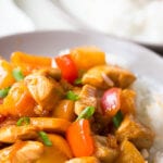 Hawaiian Chicken is a deliciously sweet and tangy sauce served over chicken and peppers and pineapple