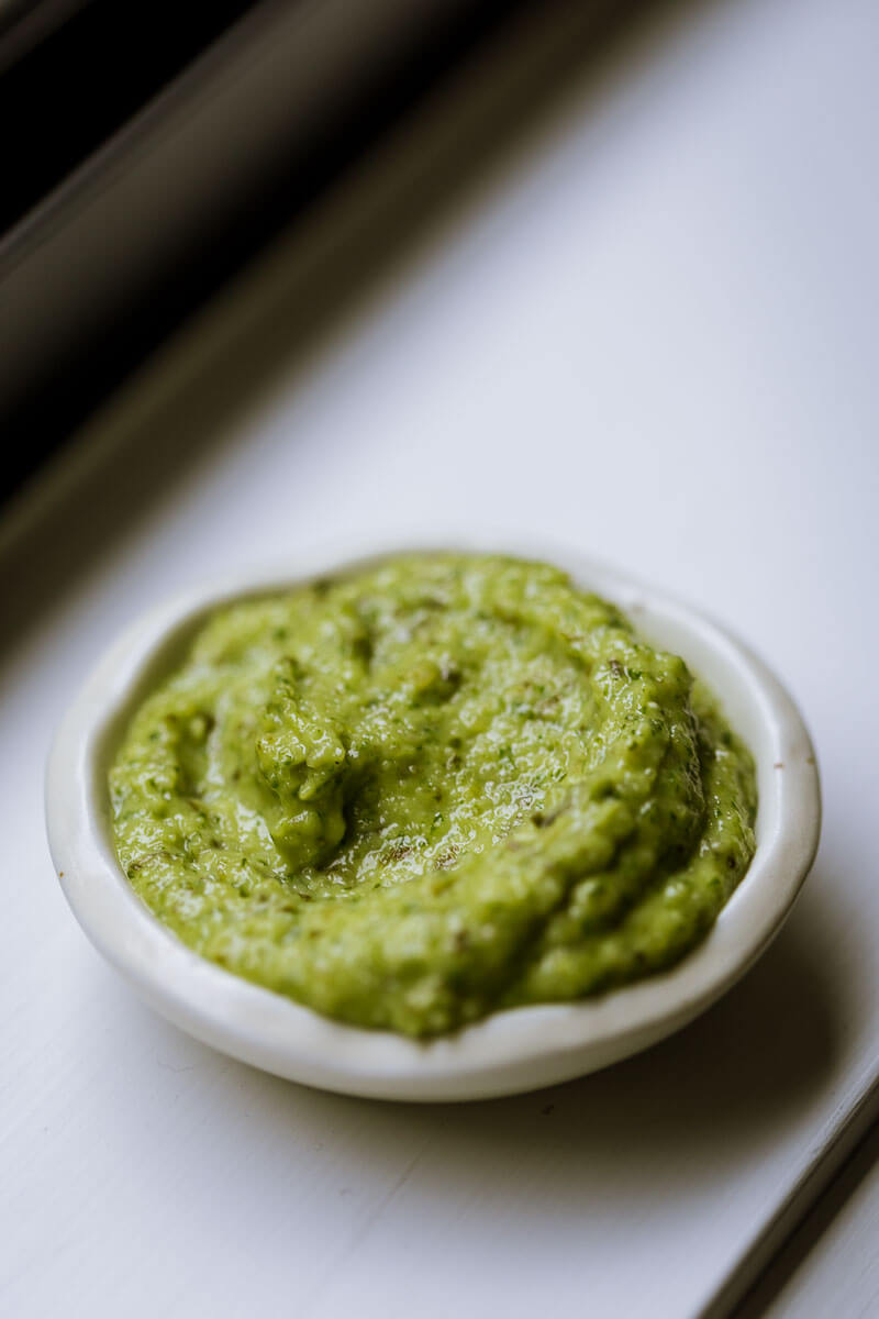 Homemade Basil Pesto - This gorgeous fresh Homemade Basil Pesto is quick and easy to make and packed with classic Italian ingredients. It's so good you'll want to eat it by the spoonful.