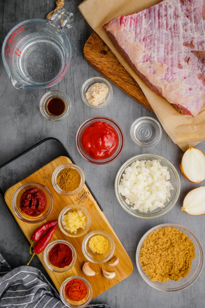 instant pot brisket ingredients in glass bowls on counter