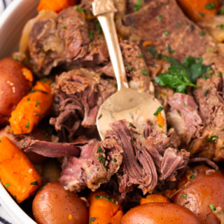 Instant Pot Pot Roast, fork tender, fall apart delicious with roasted carrots and potatoes