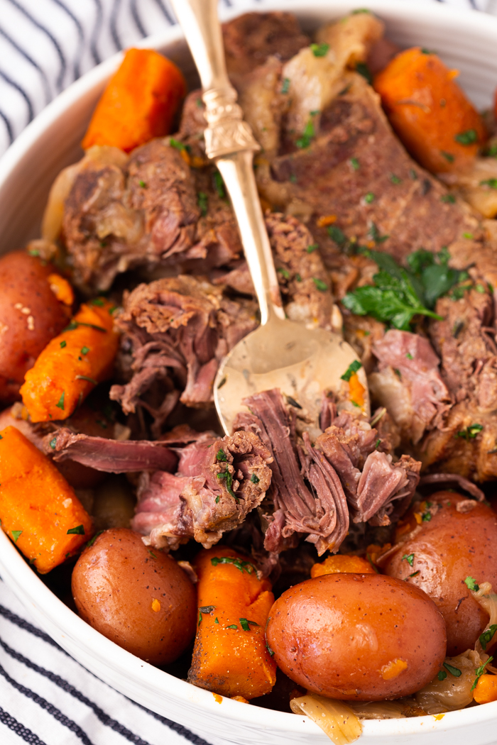 Instant Pot Pot Roast, fork tender, fall apart delicious with roasted carrots and potatoes