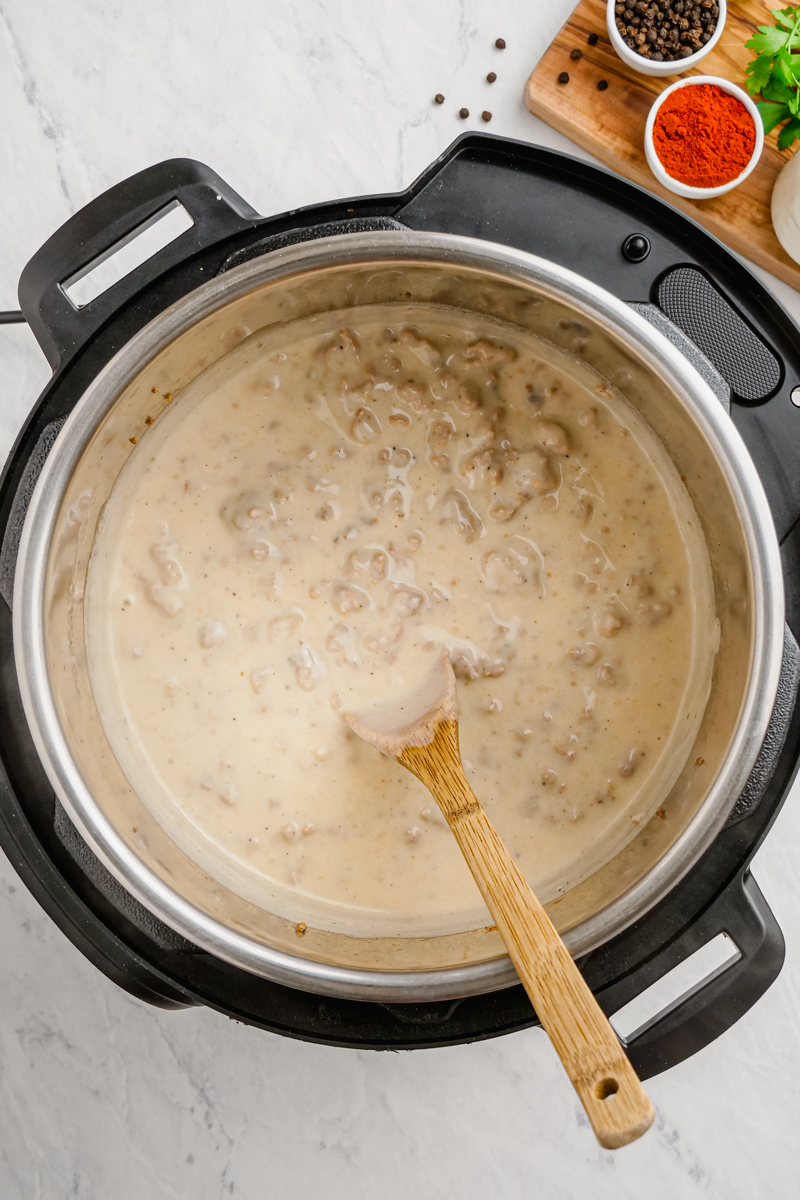 Thickened sausage gravy made in a pressure cooker