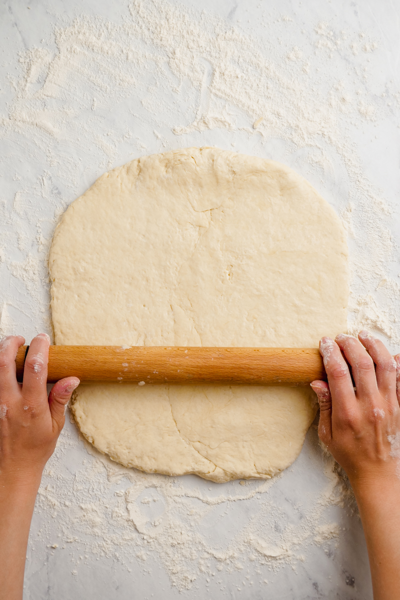 Rolling out biscuits for biscuits and gravy