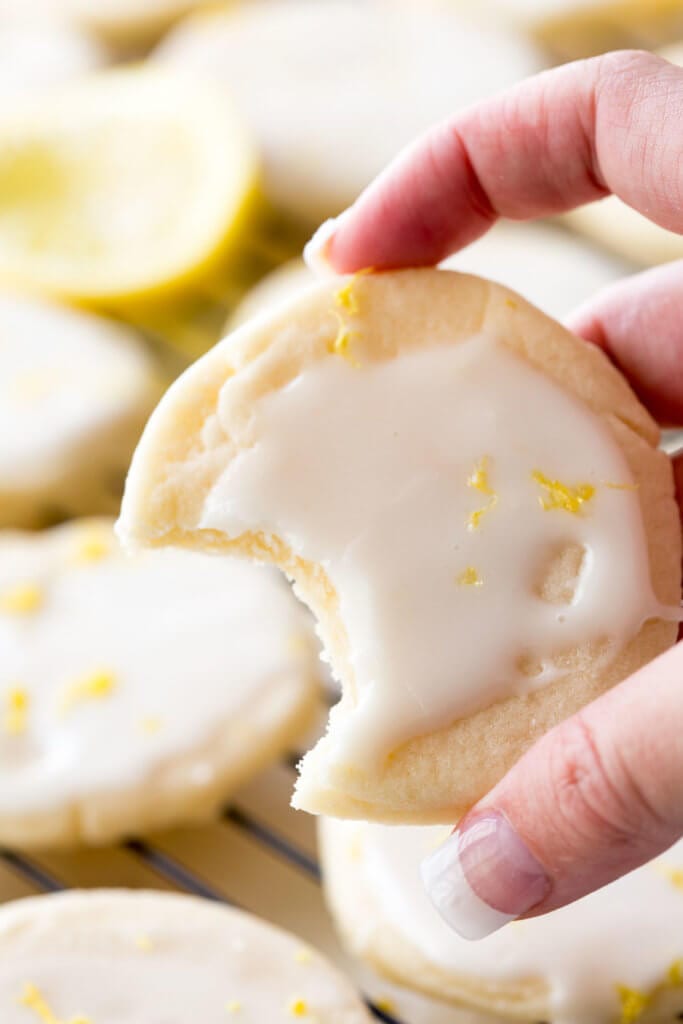 Shortbread Cookie Recipe: Literally the best cookies ever! These light, buttery cookies offer a subtle lemon flavor, and are topped with a bright and vibrant lemon glaze, giving you a mouthful of delicious goodness. These are special cookies.