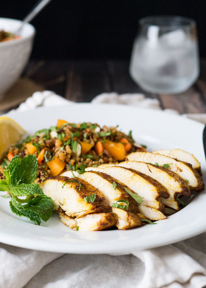 This Morrocan Baked Chicken Breast and Quinoa Salad dinner is the perfect marriage of exotic flavors and easy prep.