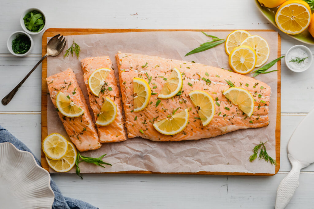 Poached salmon on a cutting board