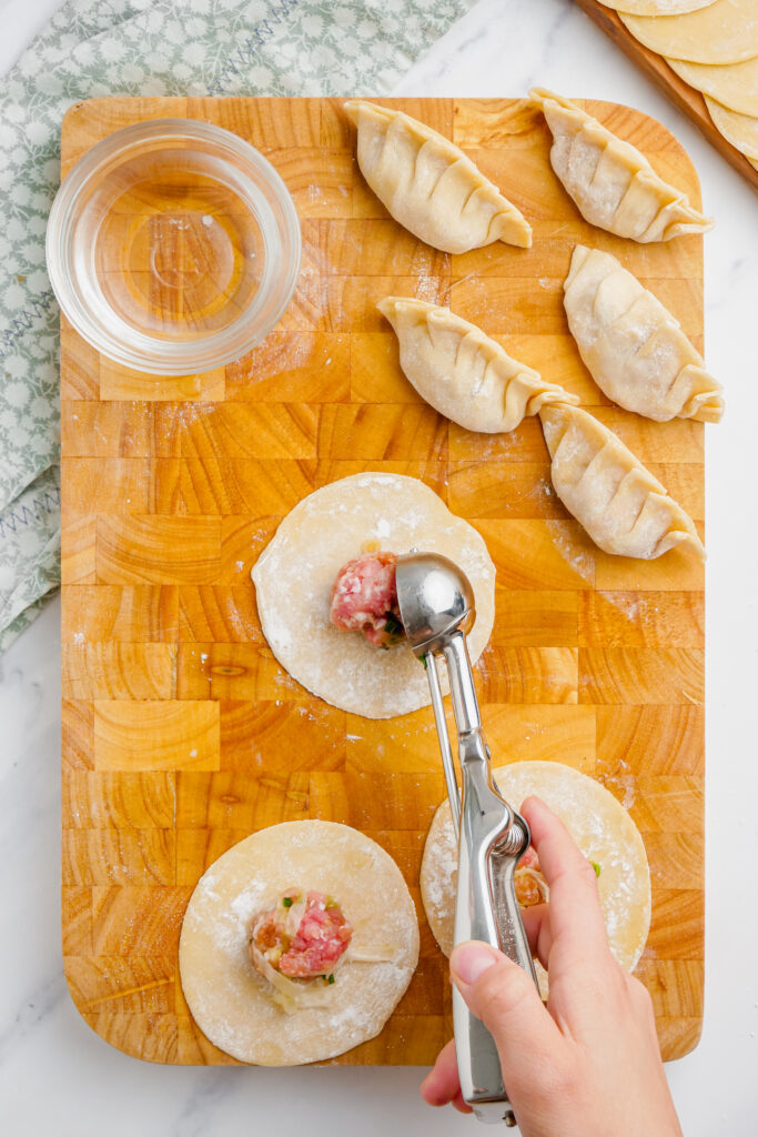 potstickers on a cutting board