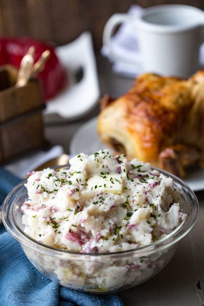 Easy Delicious Mashed Potatoes with skin on are rich, fluffy, buttery, and the perfect addition to your dinner table. And they are fluffy deliciousness rather than potato paste.