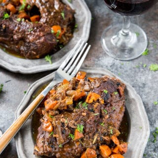 Red wine braised beef, an easy meal cooked in a dutch oven. Easy, flavorful, and delicious.