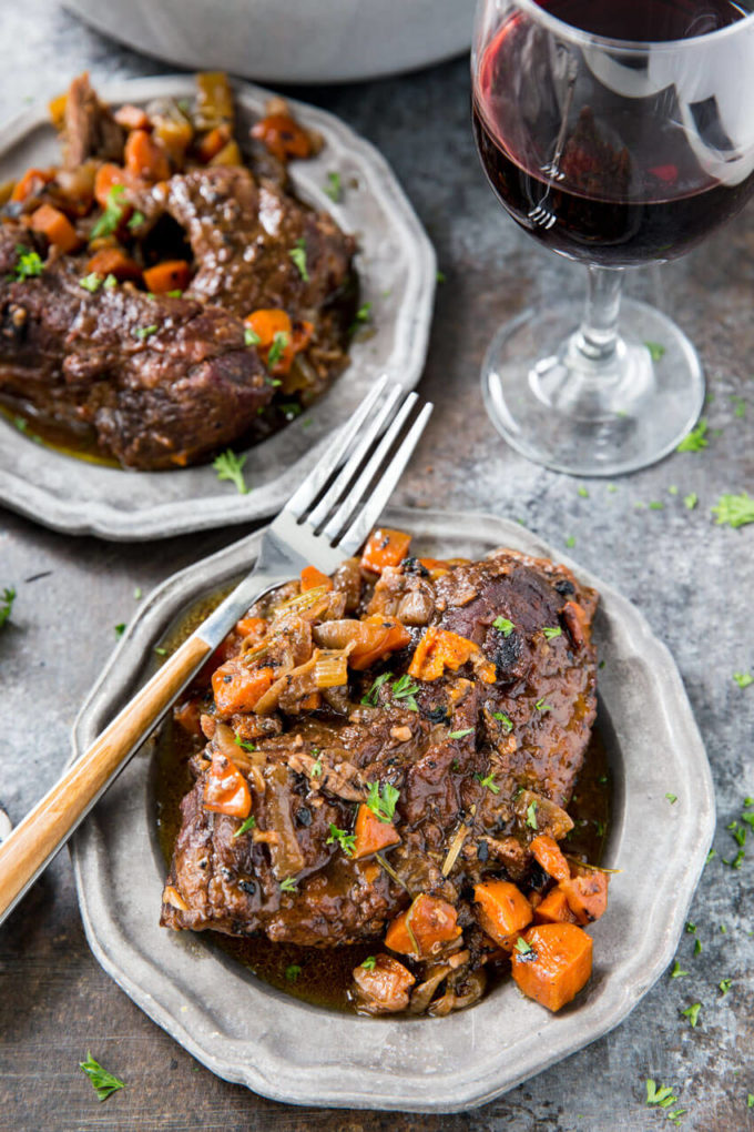 Red wine braised beef, an easy meal cooked in a dutch oven. Easy, flavorful, and delicious.