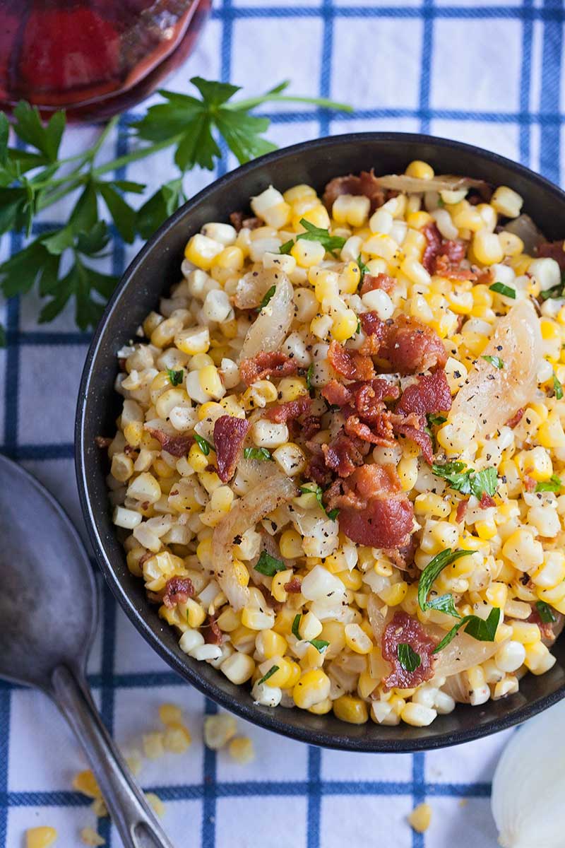 Roasted corn with bacon and caramelized onions are the best of simple flavors with a big impact. It's sure to be a side dish that even the corn reluctant eaters will enjoy!