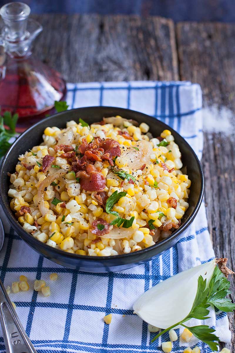 Roasted corn with bacon and caramelized onions are the best of simple flavors with a big impact. It's sure to be a side dish that even the corn reluctant eaters will enjoy!