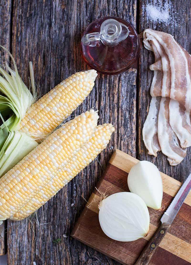 Roasted corn with bacon and caramelized onions is an amazing side dish that everyone raves about.