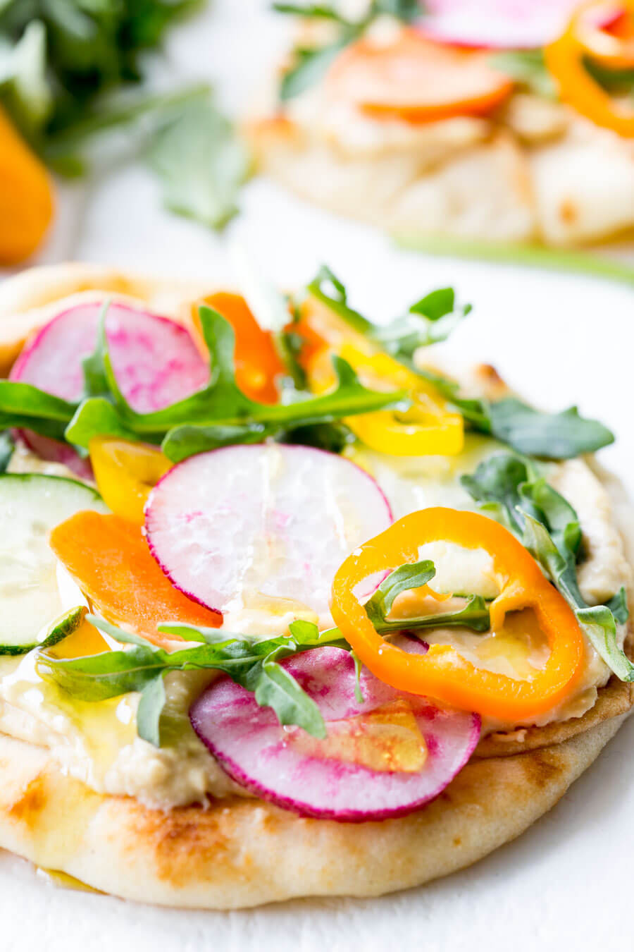 Vegetable Hummus Flatbread is loaded with fresh veggies and hummus