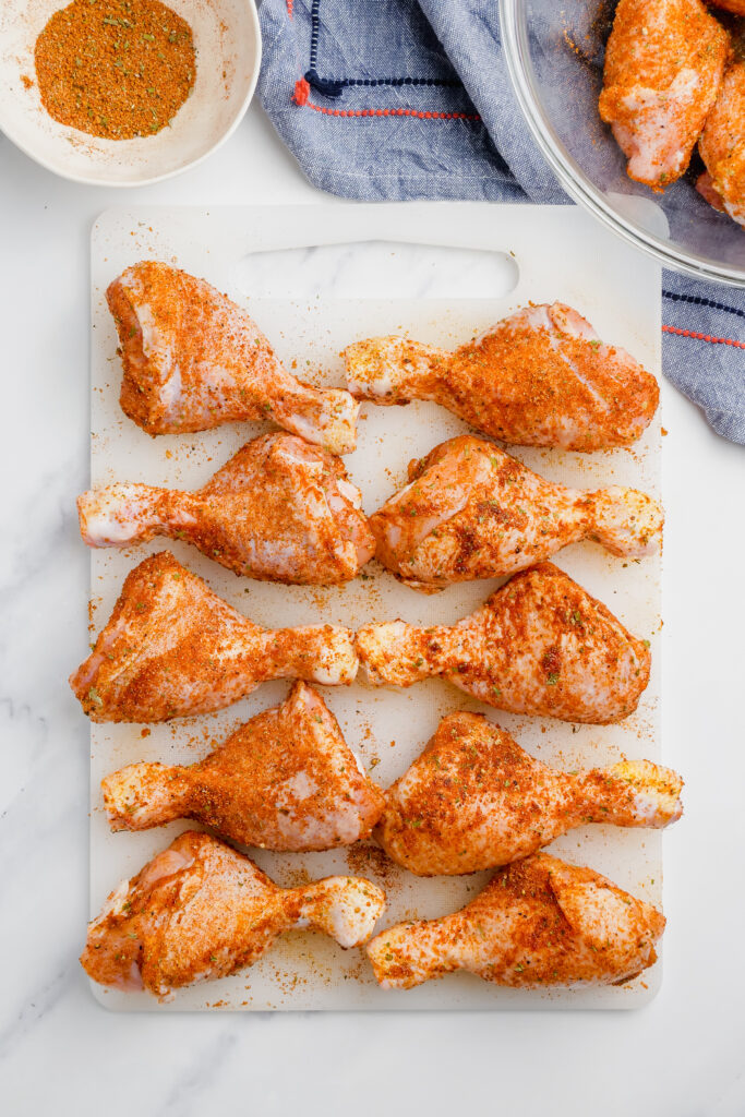 Slow Cooker Bbq Drumsticks on cutting board