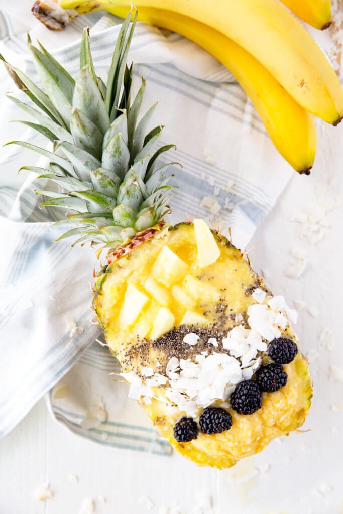 Pina Colada Smoothie Bowl. This coconut mango smoothie bowl offers a refreshing smoothie with a creamy undertone and tropical feel, bursting with mango, pineapple, and coconut flavor. Coconut milk, pineapple, mango, and coconut flakes make this a creamy, smooth, delicious breakfast or treat!