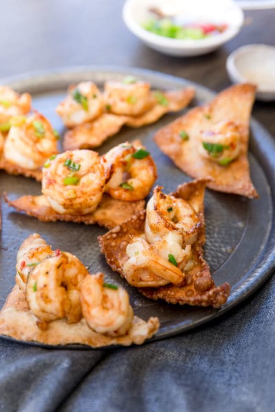 Here’s something to impress your friends that’s simple to make and packed full of spicy heat and mouthwatering flavor. These Spicy Prawns on Crispy Wontons are a must have for your next dinner party.