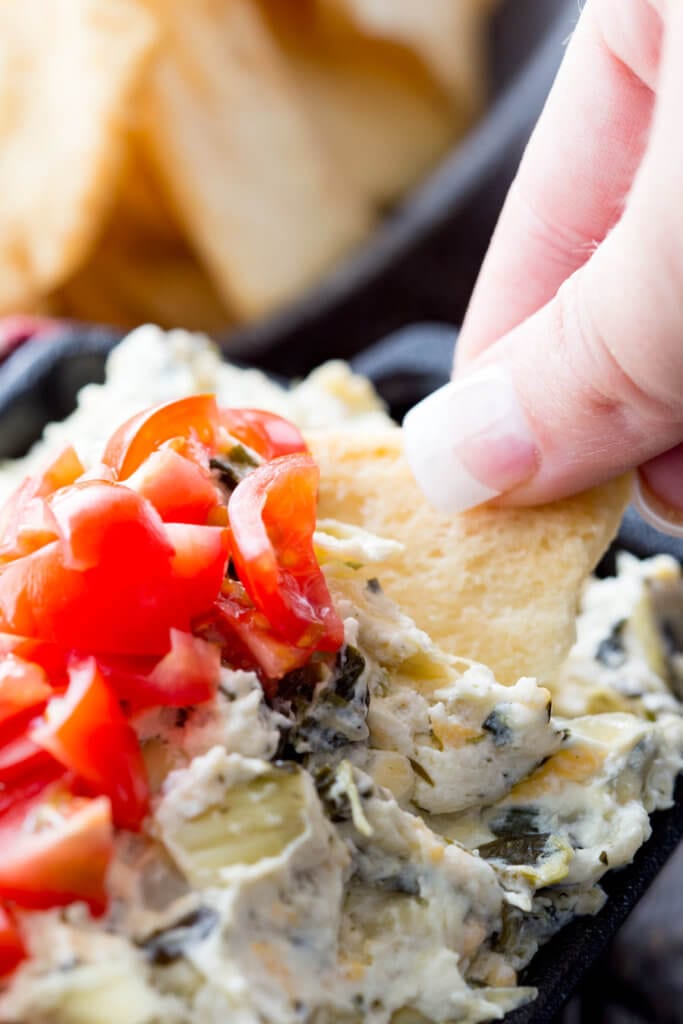 Crock pot spinach artichoke Dip is easy and delicious game day dip