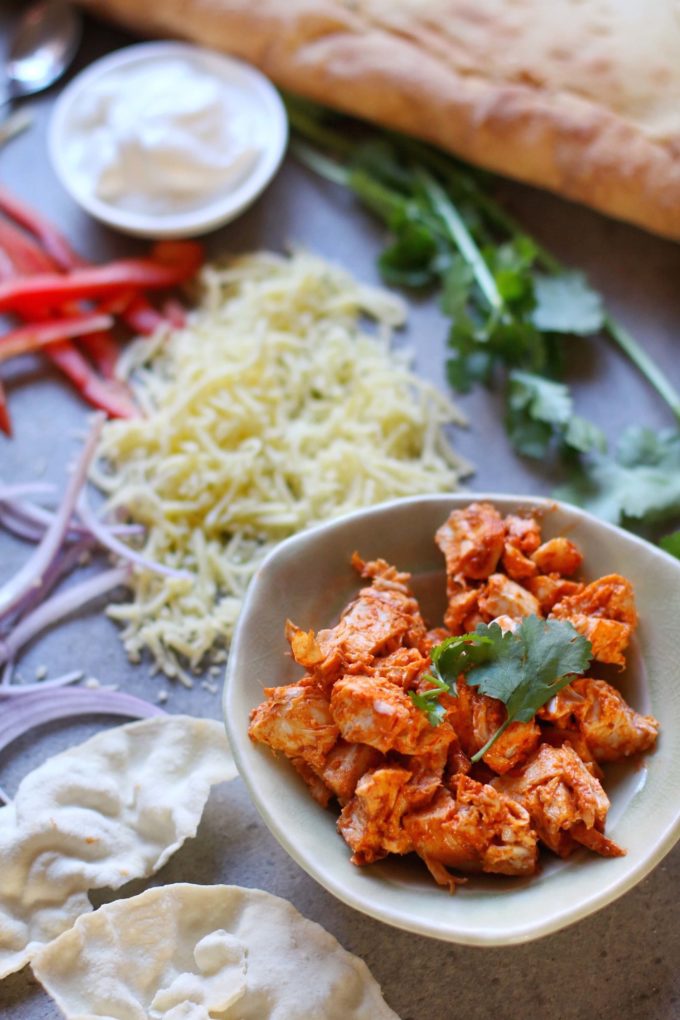 Ingredients for homemade pizza, Tandoori Chicken pizza, flavorful pizza dinner 